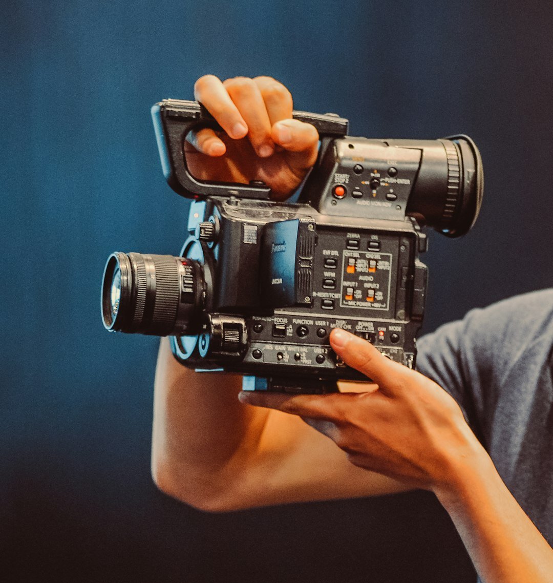 Professional Brazilian man, broadcast production director, business casual