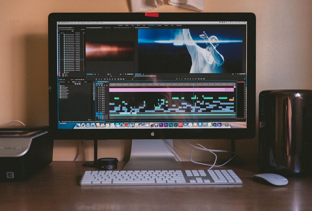 Broadcast professional at video production desk with monitors